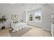 Bright bedroom with large windows, neutral decor, and comfortable bedding at 868 Tripe St, Charleston, SC 29407