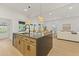 Kitchen island with a stone countertop, bar stool seating, and pendant lighting at 868 Tripe St, Charleston, SC 29407
