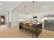 Modern kitchen featuring a center island with counter seating and stainless steel appliances at 868 Tripe St, Charleston, SC 29407
