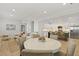 Open concept living room and kitchen with an adjacent dining area at 868 Tripe St, Charleston, SC 29407