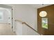 Modern staircase features natural wood accents and a unique light fixture at 868 Tripe St, Charleston, SC 29407