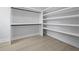 Spacious walk-in closet with ample shelving and hanging space for organized storage at 868 Tripe St, Charleston, SC 29407