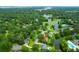 Beautiful aerial view of a home in a verdant neighborhood with a pond and golf course nearby at 919 Overview Ct, Mount Pleasant, SC 29464