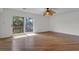 A bright bedroom with sliding door to balcony and a ceiling fan at 919 Overview Ct, Mount Pleasant, SC 29464