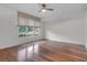 Bright bedroom with hardwood floors, a ceiling fan, and large windows at 919 Overview Ct, Mount Pleasant, SC 29464