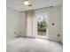 Bedroom with a ceiling fan and sliding glass door to a wood balcony with water view at 919 Overview Ct, Mount Pleasant, SC 29464