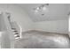 Large carpeted bonus room with stairs and vaulted ceiling, plus neutral decor at 919 Overview Ct, Mount Pleasant, SC 29464