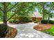Charming home with well-maintained landscaping, beautiful trees, and a spacious driveway at 919 Overview Ct, Mount Pleasant, SC 29464