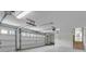 Bright two car garage with staircase and storage space, plus garage door openers at 919 Overview Ct, Mount Pleasant, SC 29464