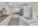 Kitchen with white cabinets, granite countertops, stainless appliances, and a center island at 919 Overview Ct, Mount Pleasant, SC 29464