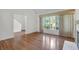 Bright living room with hardwood floors, a large window, and a fireplace at 919 Overview Ct, Mount Pleasant, SC 29464