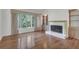 Cozy living room features a fireplace, built-in shelving, and large windows at 919 Overview Ct, Mount Pleasant, SC 29464