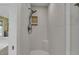 Shower with glass doors, tiled walls, built in nook, and shower seat at 919 Overview Ct, Mount Pleasant, SC 29464