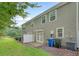 Spacious backyard with a patio, vinyl siding, and green lawn at 9646 Scarborough Ct, Summerville, SC 29485