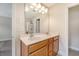 Bathroom featuring double sink vanity with white countertop and a view of the enclosed shower at 9646 Scarborough Ct, Summerville, SC 29485