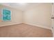 Bedroom with neutral carpet, and light-colored walls with a view of the outdoors at 9646 Scarborough Ct, Summerville, SC 29485