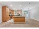 Well-lit kitchen featuring wood cabinets and stainless steel appliances at 9646 Scarborough Ct, Summerville, SC 29485