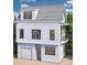 Charming two-story home with a garage and balcony, surrounded by lush greenery at 1 Nats Ct, Charleston, SC 29403