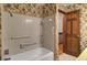 Functional bathroom featuring a bathtub and shower with tiled surround at 103 Kenninghall Rd, Goose Creek, SC 29445