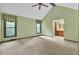 Large bedroom with high ceilings, carpet, and a ceiling fan at 103 Kenninghall Rd, Goose Creek, SC 29445