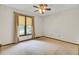 Bright bedroom with a window with curtains, offering natural light and privacy at 103 Kenninghall Rd, Goose Creek, SC 29445