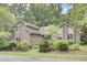 Well-maintained brick home with lush landscaping and a picturesque setting at 103 Kenninghall Rd, Goose Creek, SC 29445
