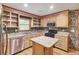 Eat-in Kitchen features stainless steel appliances, wood cabinetry and island at 103 Kenninghall Rd, Goose Creek, SC 29445