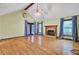 Open living area with hardwood floors, fireplace and large windows at 103 Kenninghall Rd, Goose Creek, SC 29445