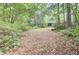 View of home and yard through the mature trees at 103 Kenninghall Rd, Goose Creek, SC 29445