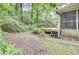 Exterior view of the home shows the deck, screen porch, and steps leading to the yard at 103 Kenninghall Rd, Goose Creek, SC 29445