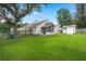 Large backyard with mature trees and a storage shed at 1042 Steelechase Ln, Hanahan, SC 29410