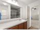 Bathroom with vanity, mirror, and walk-in shower at 1042 Steelechase Ln, Hanahan, SC 29410