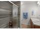 Modern bathroom with glass-enclosed shower and vanity at 1042 Steelechase Ln, Hanahan, SC 29410