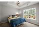 Cozy bedroom with large window at 1042 Steelechase Ln, Hanahan, SC 29410