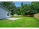 Spacious fenced backyard with grass, and useful shed at 105 Glebe Rd, Summerville, SC 29485
