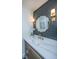 Beautiful bathroom with marble countertop, stylish mirror, lighting, and nice gold fixtures at 105 Glebe Rd, Summerville, SC 29485