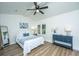 Bright bedroom with vaulted ceiling, ceiling fan, natural light, and stylish furnishings and decor at 105 Glebe Rd, Summerville, SC 29485