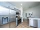 Bright, updated kitchen showcasing stainless steel appliances and gray cabinetry with modern hardware at 105 Glebe Rd, Summerville, SC 29485