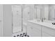 Bathroom featuring a glass-enclosed shower with modern fixtures, white vanity with solid surface countertops at 105 Oast Ln, Summerville, SC 29485