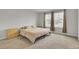 Bedroom featuring neutral walls, carpet flooring, and two windows with natural light at 105 Oast Ln, Summerville, SC 29485