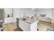 Modern kitchen featuring an island with granite countertops, stainless steel appliances, and an open concept design at 105 Oast Ln, Summerville, SC 29485