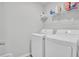 Laundry room featuring a washer, dryer, and shelving for storage at 105 Oast Ln, Summerville, SC 29485