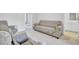Comfortable living room featuring neutral walls, carpet, and a seating area at 105 Oast Ln, Summerville, SC 29485