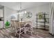 Bright dining area featuring a table with seating for four and stylish decor at 111 Nolin Road Rd, Moncks Corner, SC 29461