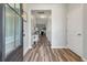 Inviting foyer with hardwood floors, leading to a living space with fireplace at 111 Nolin Road Rd, Moncks Corner, SC 29461