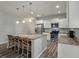 Modern kitchen with white cabinets, granite countertops, stainless steel appliances, and an island at 111 Nolin Road Rd, Moncks Corner, SC 29461