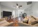 Open living area with hardwood floors, comfortable sofas, and media center at 111 Nolin Road Rd, Moncks Corner, SC 29461