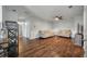 Bright living room boasts hardwood floors, neutral colors, and cozy seating arrangement at 111 Nolin Road Rd, Moncks Corner, SC 29461