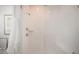 Modern walk-in shower with glass door, white subway tile, rainfall shower head and a built-in bench at 124 Maritime Way, Summerville, SC 29485