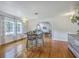 Open dining area with hardwood floors and easy access to the living room at 1314 Cooper Store Rd, Moncks Corner, SC 29461